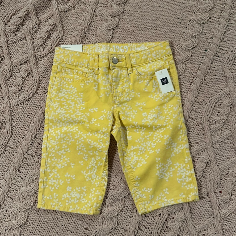 Bermuda shorts Gap in a muted yellow color